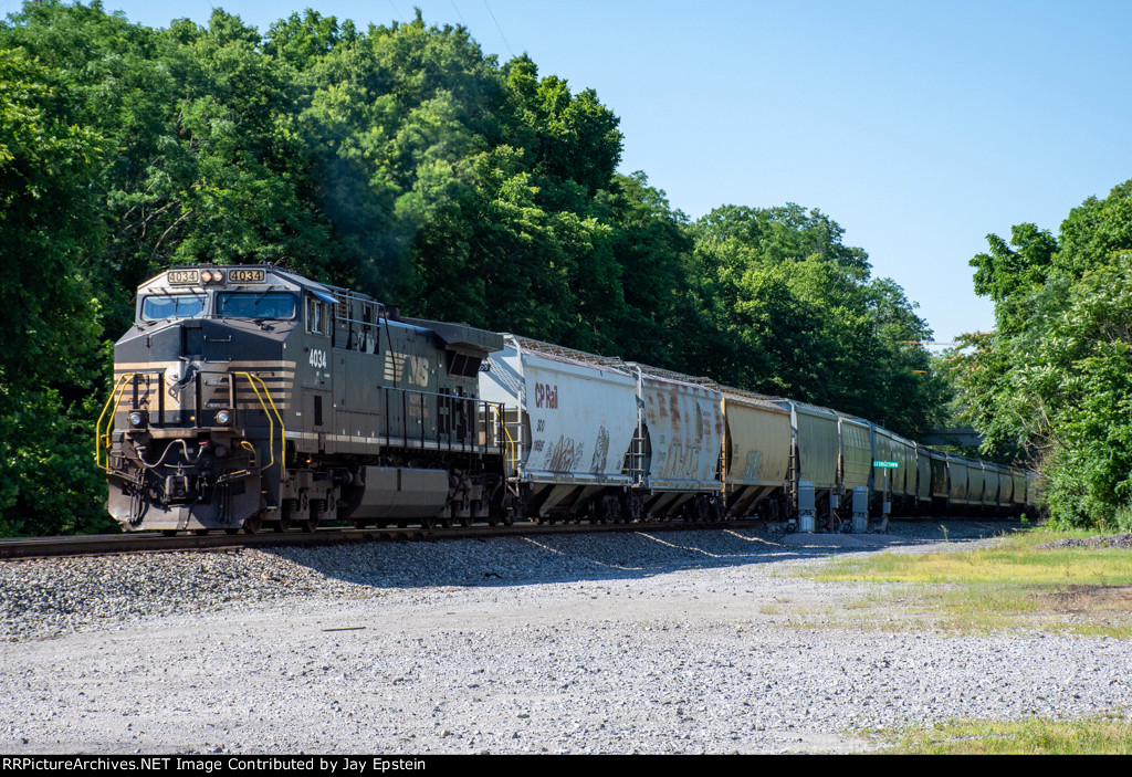 NS 4034 shoves on the rear of 177